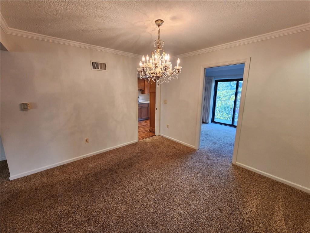 923 California Avenue, Unit 605606 Avalon, PA 15202 - Photo 12 of 50 a view of a chandelier in big room and chandelier