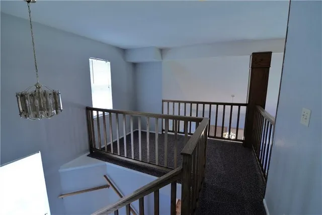 a view of balcony with wooden floor