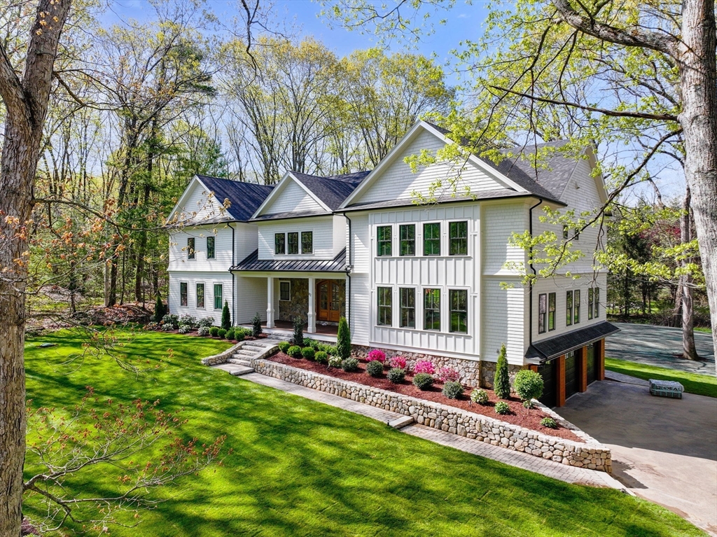 82 Deer Path Lane Weston, MA 02493 - Photo 1 of 42 front view of a house with a yard