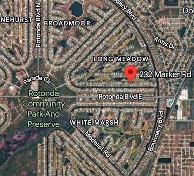 a sign on the side of a street