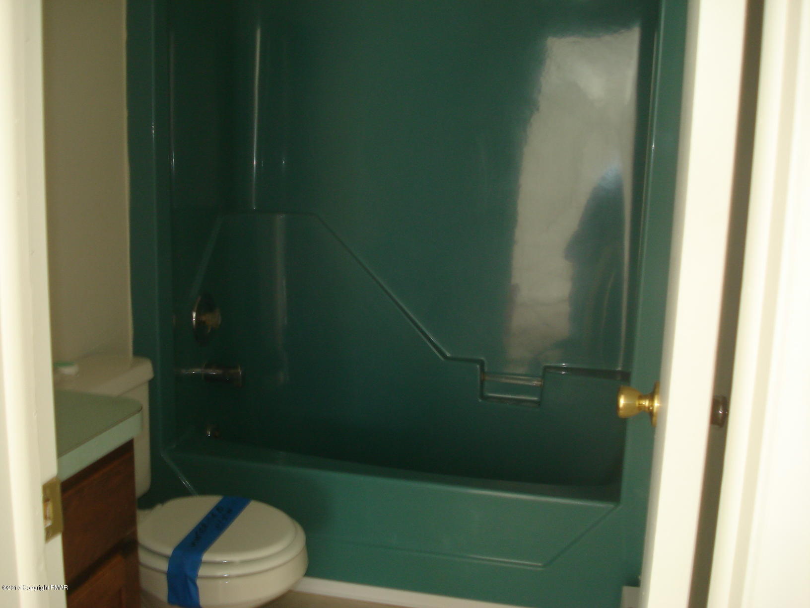 611 Gold Finch Road Bushkill, PA 18324 - Photo 4 of 16 a bathroom with a shower a toilet and a sink