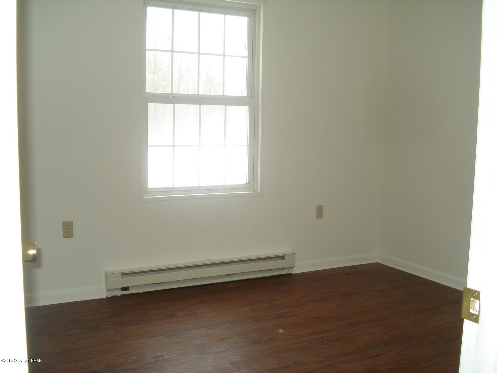 611 Gold Finch Road Bushkill, PA 18324 - Photo 7 of 16 an empty room with a window