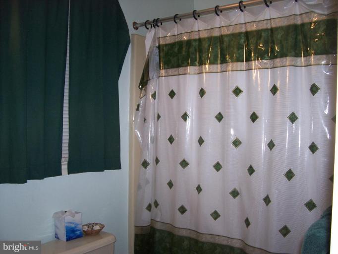 206 Oakwood Road Edgewater, MD 21037 - Photo 4 of 12 a view of bathroom with a shower