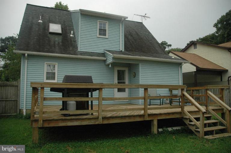 206 Oakwood Road Edgewater, MD 21037 - Photo 10 of 12 a front view of house with deck
