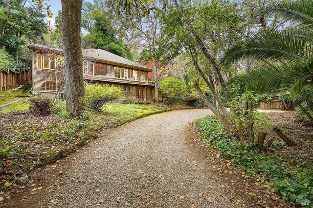a view of house with outdoor space