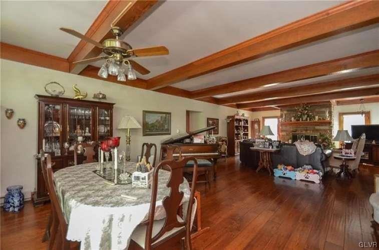 2936 River Road Mount Bethel, PA 18343 - Photo 12 of 20 a view of a dining room with furniture window and wooden floor