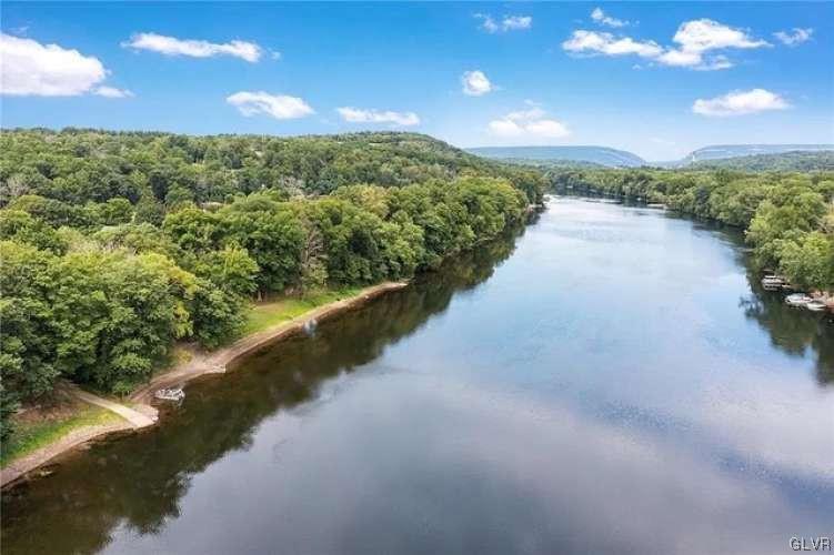2936 River Road Mount Bethel, PA 18343 - Photo 19 of 20 a view of a lake with a city