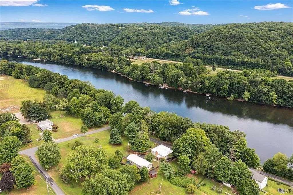 2936 River Road Mount Bethel, PA 18343 - Photo 20 of 20 an aerial view of a residential houses with outdoor space and lake view