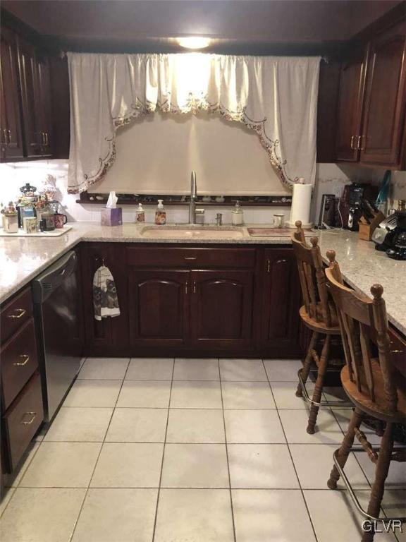 2936 River Road Mount Bethel, PA 18343 - Photo 10 of 20 a kitchen with a sink a stove and cabinets