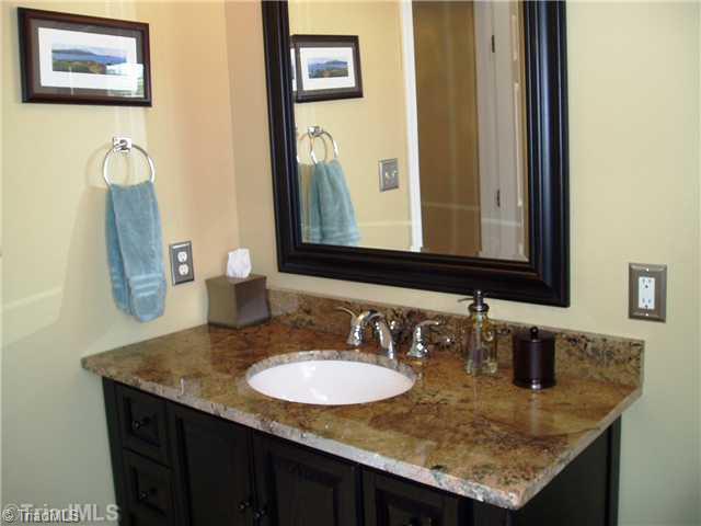 8052 Glengarriff Road Clemmons, NC 27012 - Photo 12 of 16 Other Bath. Other 2nd. floor full bath. Tile and updated fixture. All tolets in the home have been upgraded and replaced.