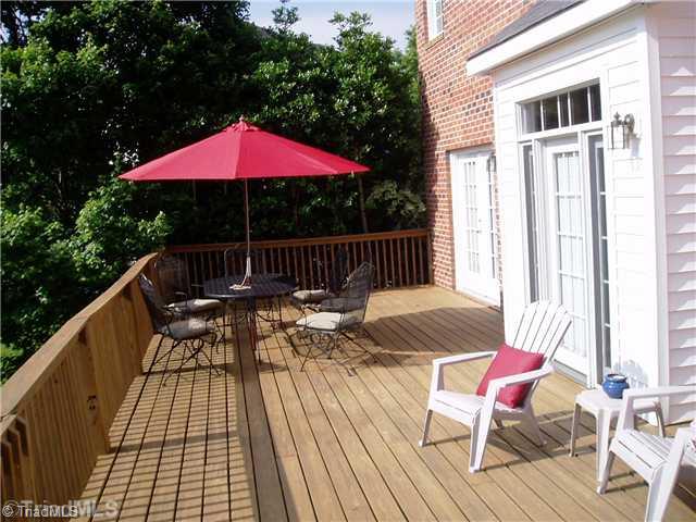 8052 Glengarriff Road Clemmons, NC 27012 - Photo 5 of 16 Patio/Deck. Large deck off the breakfast area and also off the living room is perfect for entertaining. The rear of the home faces east, so the evening sun does not interfere with afternoon enjoyment.