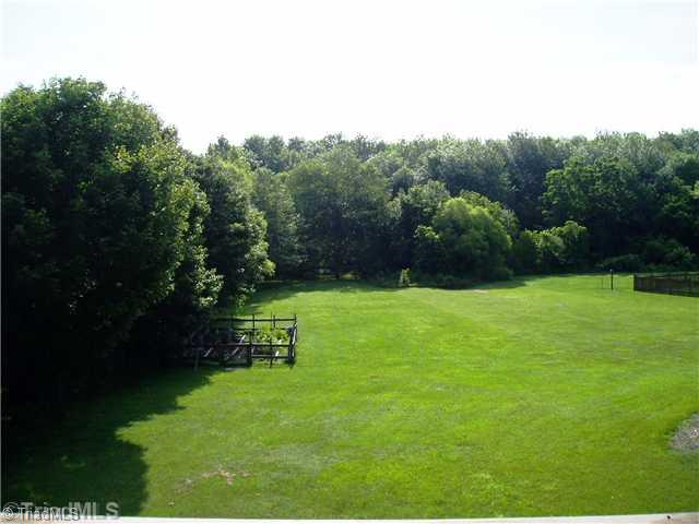 8052 Glengarriff Road Clemmons, NC 27012 - Photo 6 of 16 Yard/Garden. This large private backyard needs kids to play, or maybe Dad needs to practice his 100 chip shot!. Garden space in place, mature trees, and lots of room. Viewed from the deck.