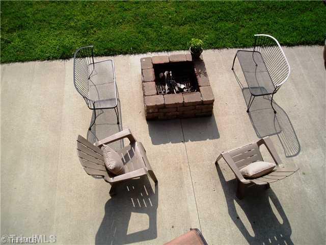 8052 Glengarriff Road Clemmons, NC 27012 - Photo 7 of 16 Patio/Deck. Extended patio with fire pit for cook outs, entertaining on cool fall nights. Hot dogs and smores!