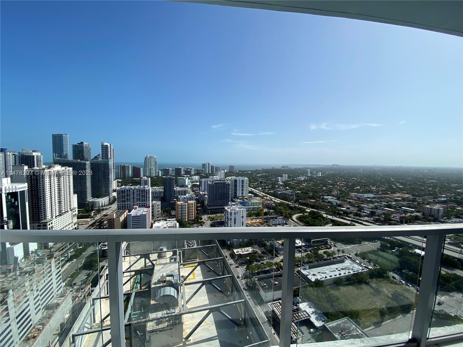 185 Southwest 7th Street, Unit 4110 Miami, FL 33130 - Photo 11 of 14 a view of a city from a balcony