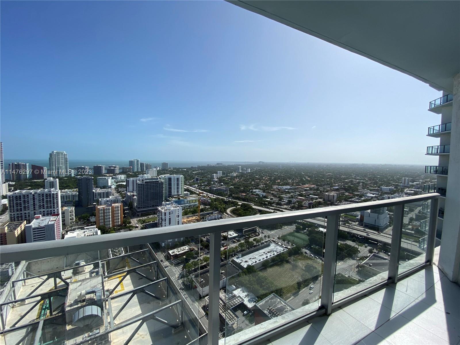 185 Southwest 7th Street, Unit 4110 Miami, FL 33130 - Photo 13 of 14 a view of a balcony with city view