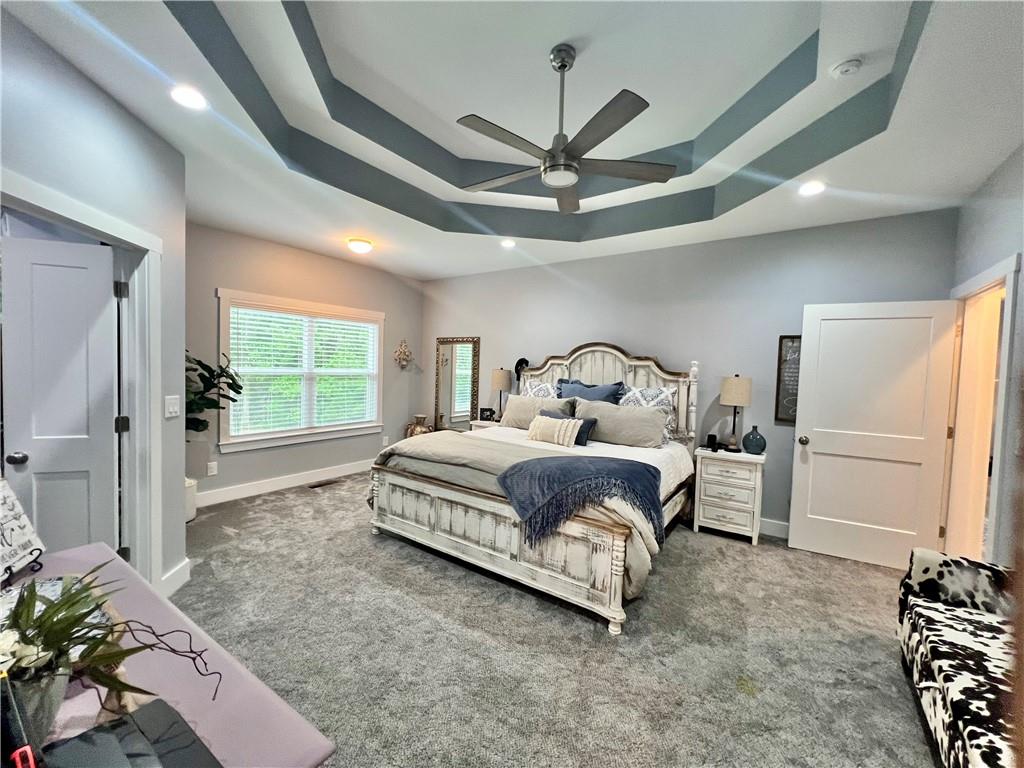 566 Clinton Drive Temple, GA 30179 - Photo 15 of 40 a bedroom with a bed next to a window