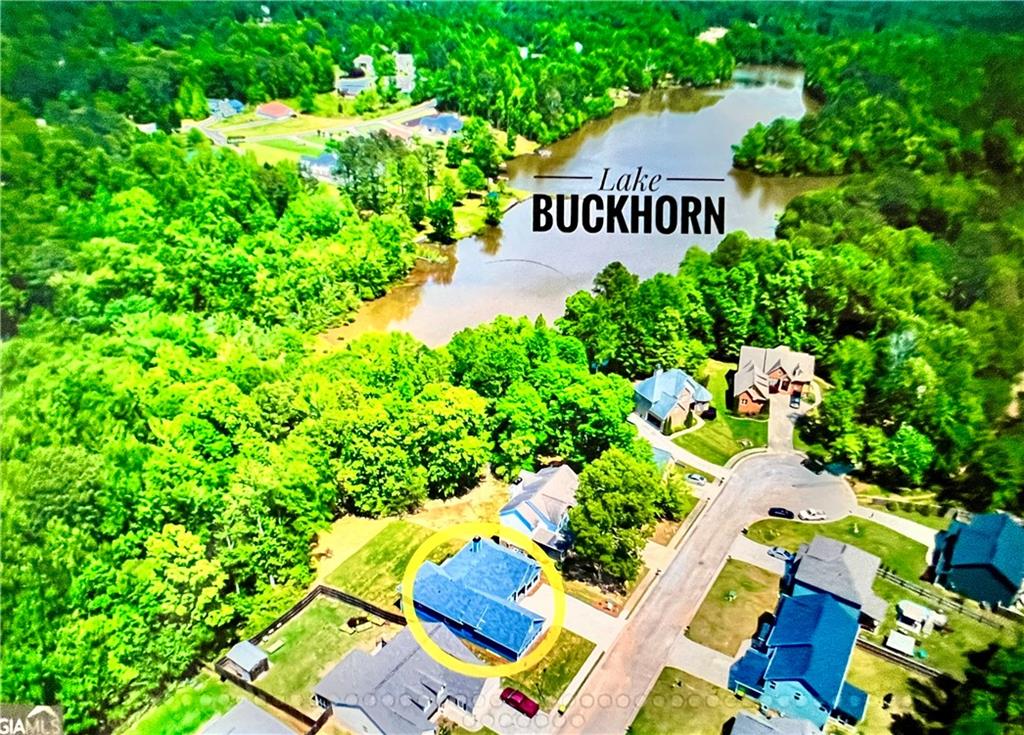 566 Clinton Drive Temple, GA 30179 - Photo 2 of 40 a view of a sign in a garden