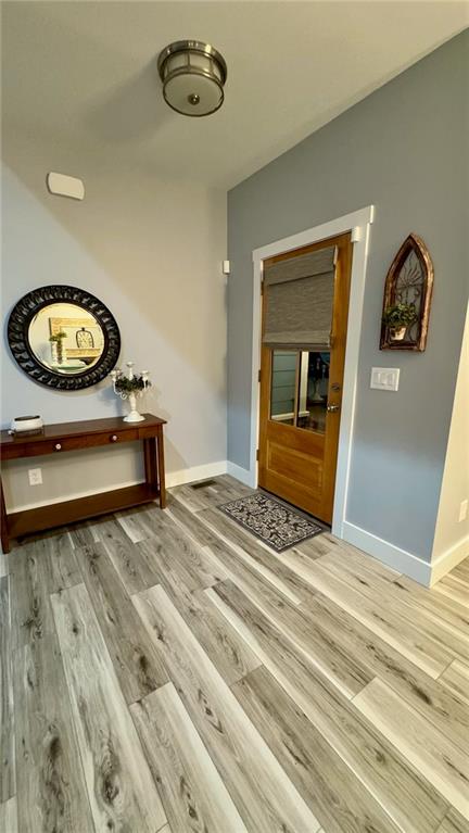 566 Clinton Drive Temple, GA 30179 - Photo 3 of 40 a bedroom with a bed and a mirror