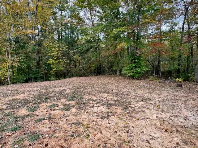 a view of an outdoor space with a lake view