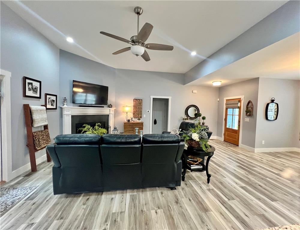 566 Clinton Drive Temple, GA 30179 - Photo 6 of 40 a living room with furniture and a flat screen tv