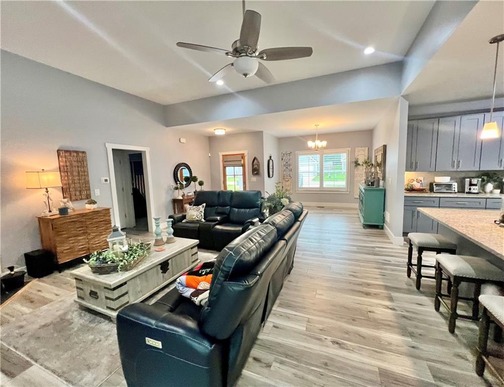 566 Clinton Drive Temple, GA 30179 - Photo 7 of 40 a living room with furniture and wooden floor