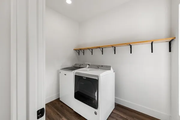 a utility room with dryer and washer