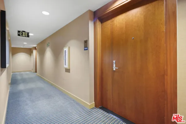 a view of a balcony with a floor to ceiling windows