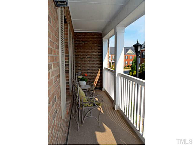 1364 Regulator Street Raleigh, NC 27603 - Photo 15 of 24 a view of a porch and a yard