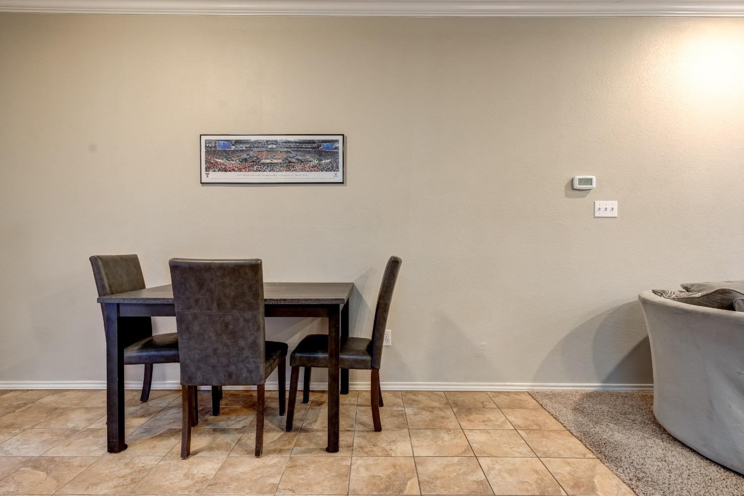 2102 Main Street, Unit 5 Lubbock, TX 79401 - Photo 11 of 27 a view of a dining room with furniture