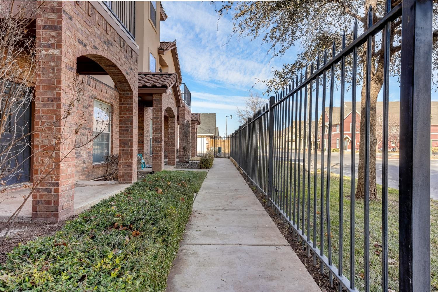 2102 Main Street, Unit 5 Lubbock, TX 79401 - Photo 4 of 27 a view of a pathway that has stairs