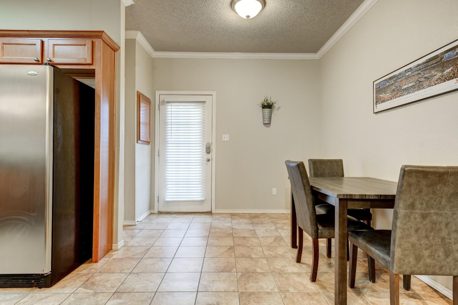 2102 Main Street, Unit 5 Lubbock, TX 79401 - Photo 10 of 27 a view of a dining room with furniture