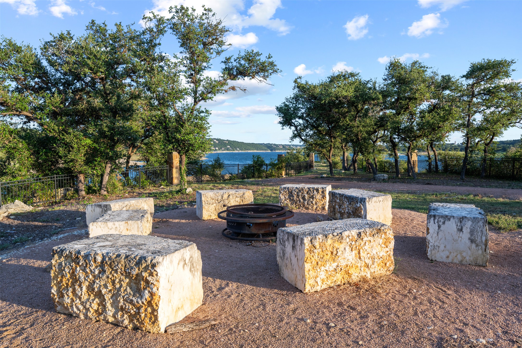 8204 Prairie Rye Drive Lago Vista, TX 78645 - Photo 33 of 39 Neighborhood fire pit with lake views.