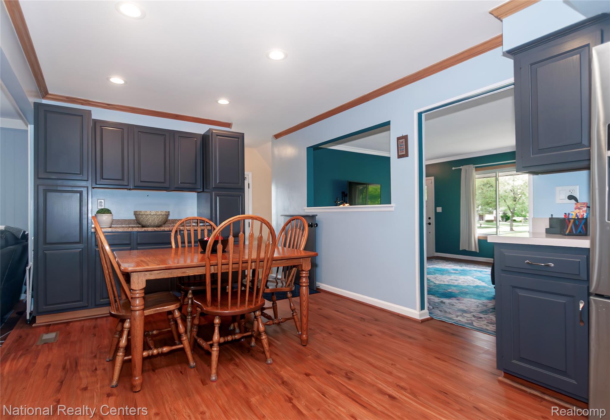 2446 Milverton Road Troy, MI 48083 - Photo 11 of 41 Dining room featuring crown molding, light wood finished floors, and recessed lighting