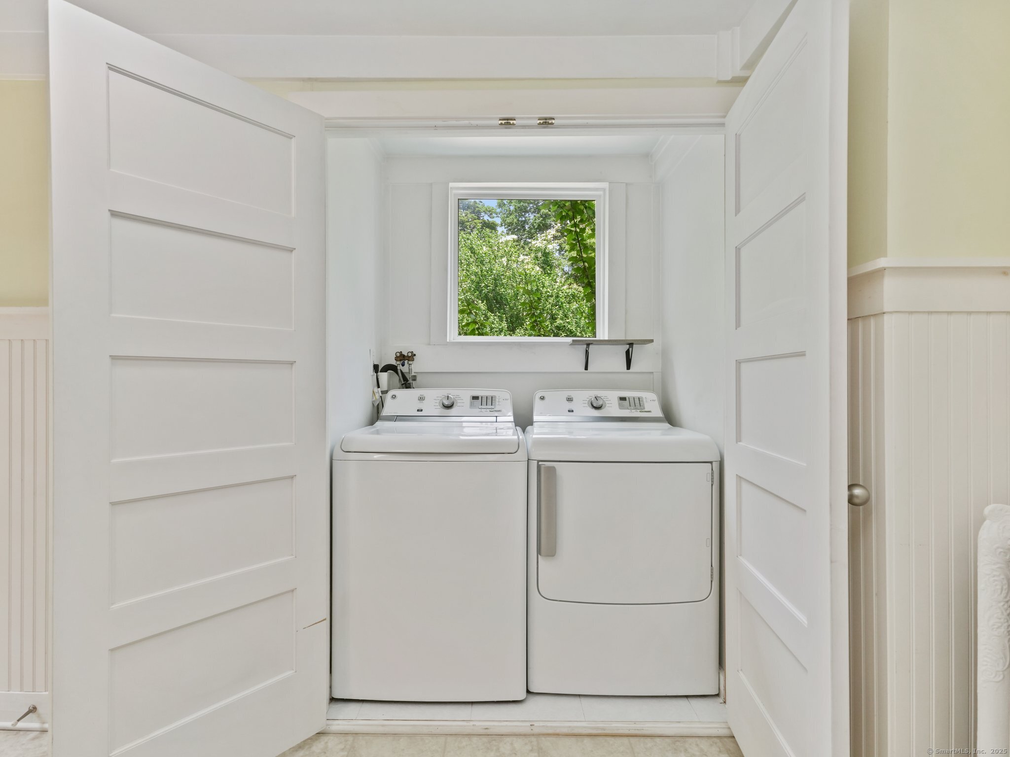 355 Main Street Old Saybrook, CT 06475 - Photo 14 of 29 a utility room with closet dryer and washer