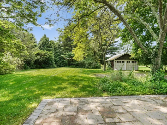 a view of backyard with green space