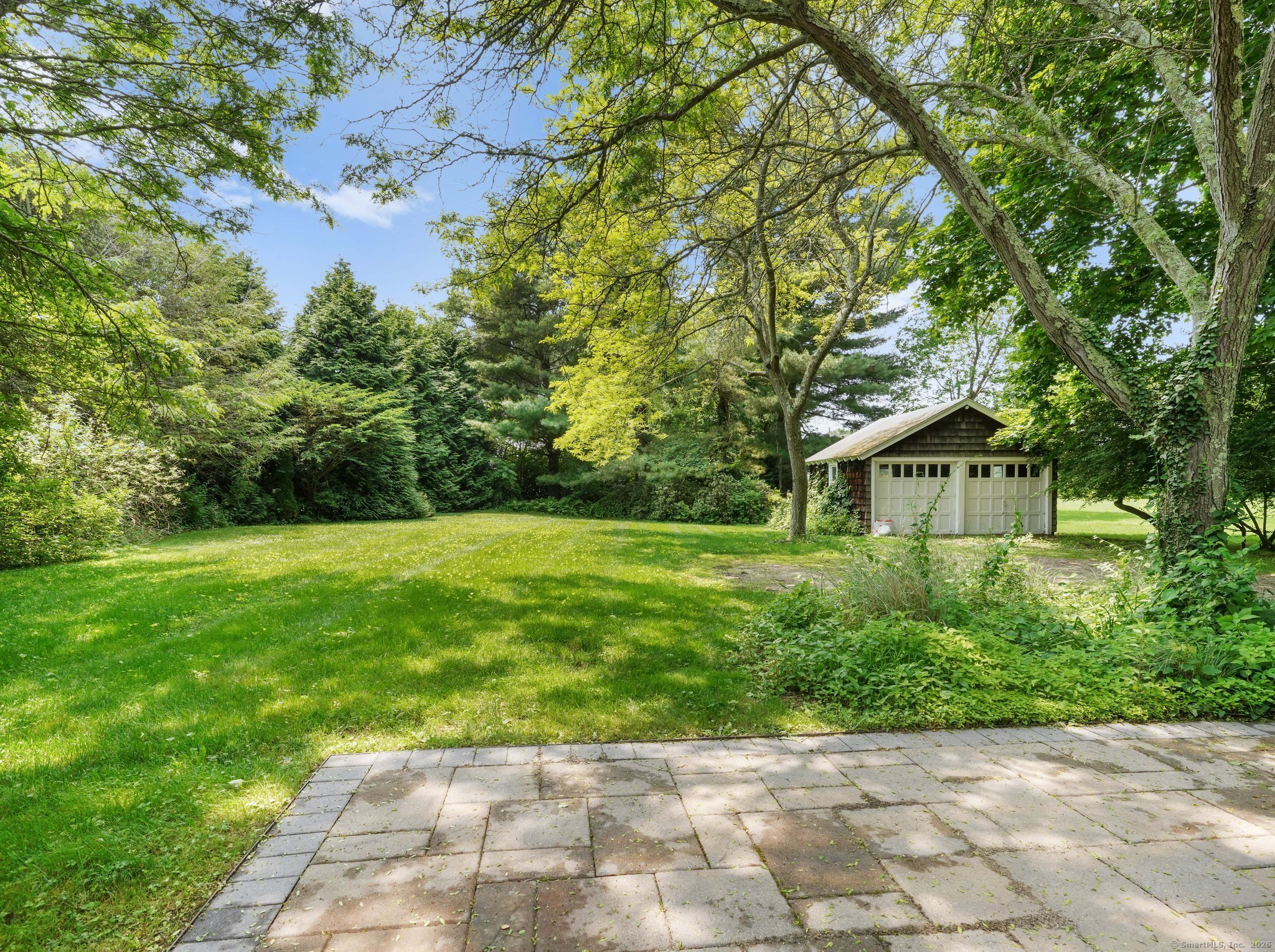 355 Main Street Old Saybrook, CT 06475 - Photo 24 of 29 a view of backyard with green space
