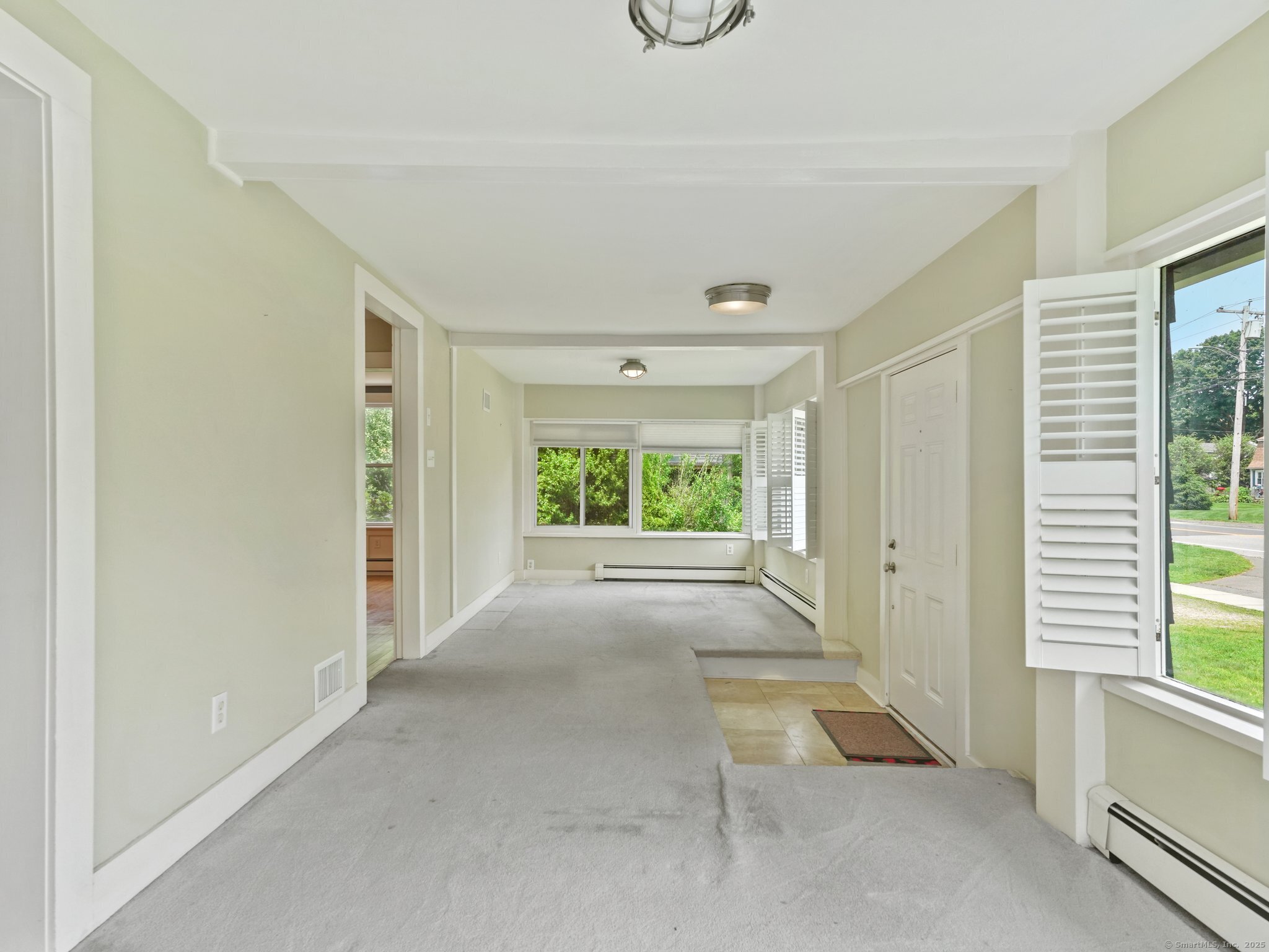 355 Main Street Old Saybrook, CT 06475 - Photo 3 of 29 a view of entryway with wooden floor