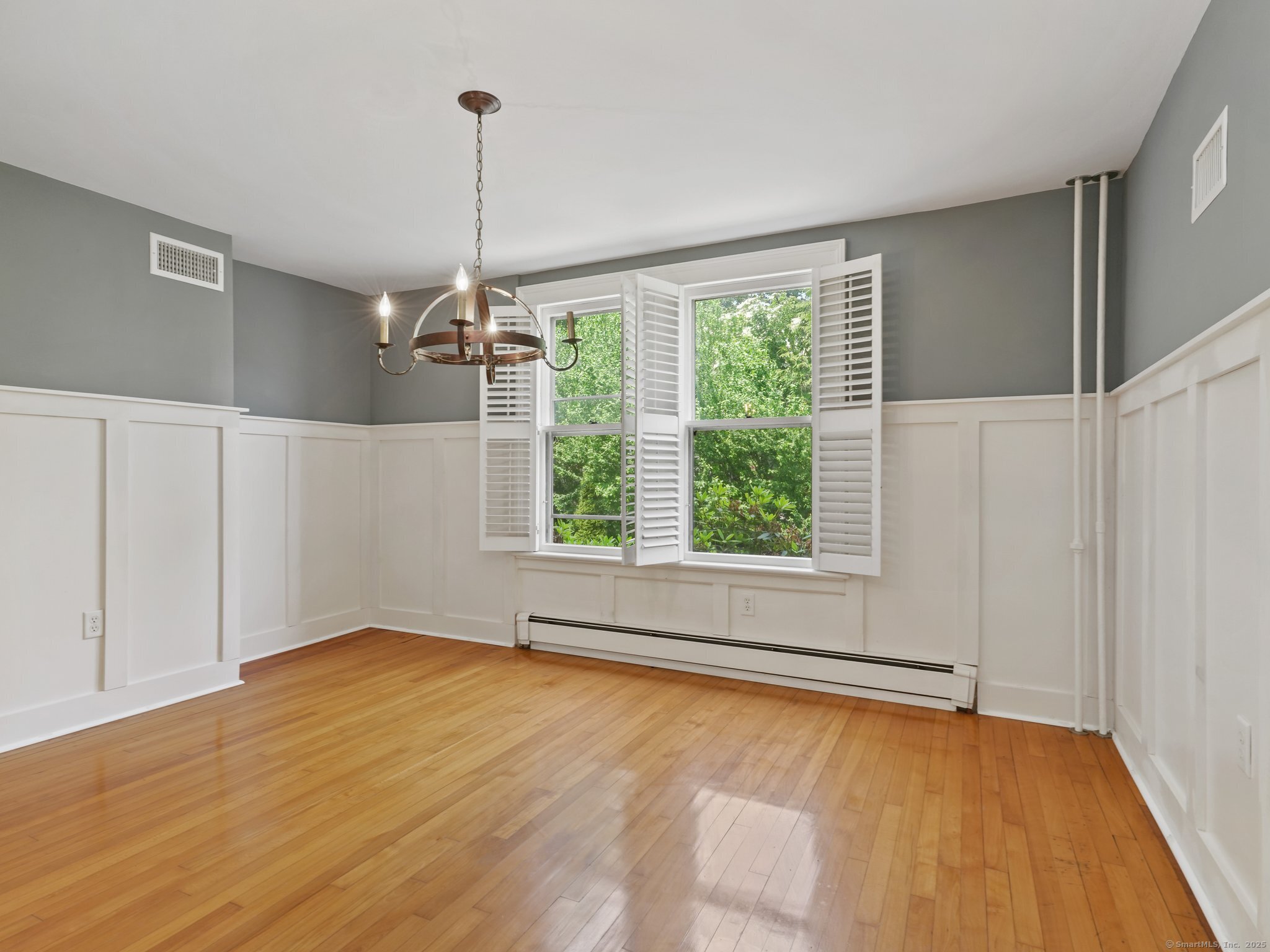 355 Main Street Old Saybrook, CT 06475 - Photo 4 of 29 a view of a room with window wooden floor and ceiling fans