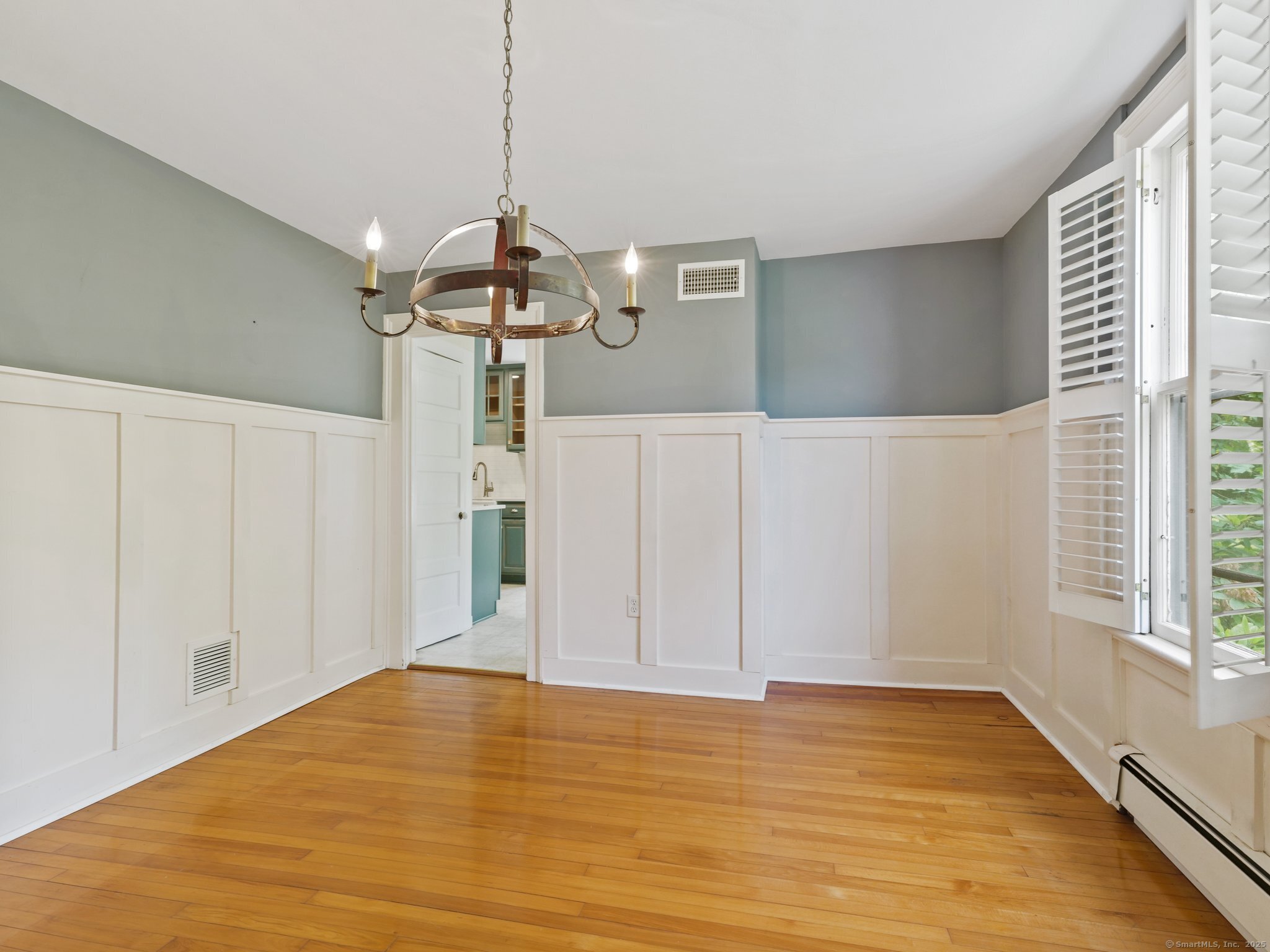355 Main Street Old Saybrook, CT 06475 - Photo 5 of 29 a view of empty room with wooden floor and ceiling fan