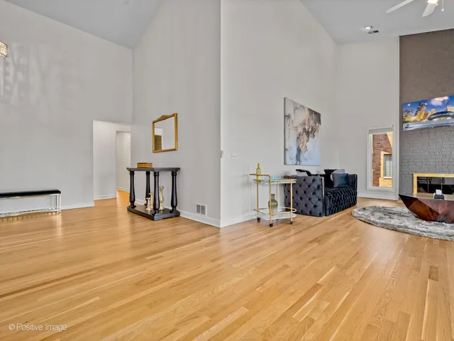 a room with a bed and a flat screen tv