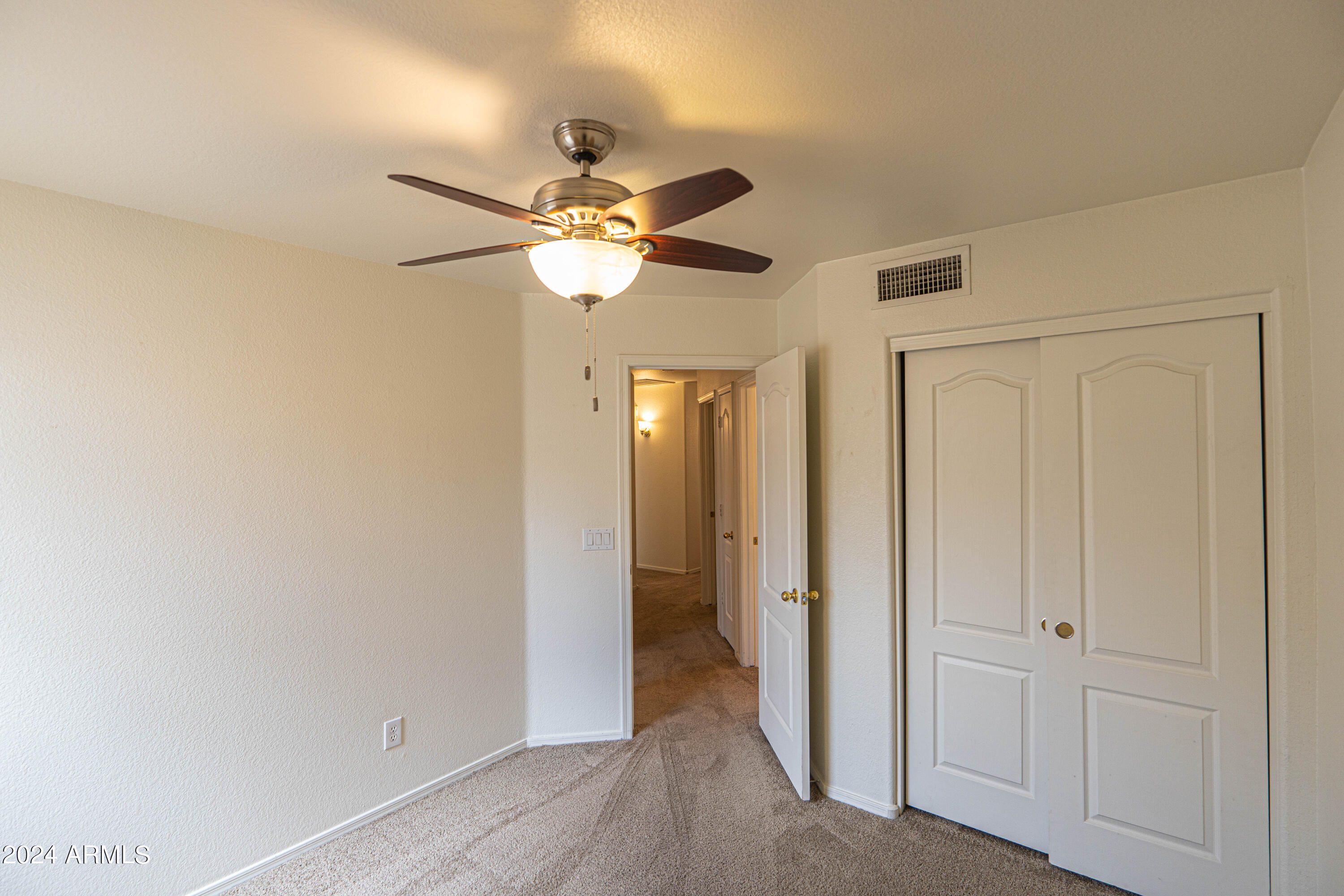 1729 East Del Rio Street Gilbert, AZ 85295 - Photo 14 of 19 a view of a livingroom with a chandelier fan
