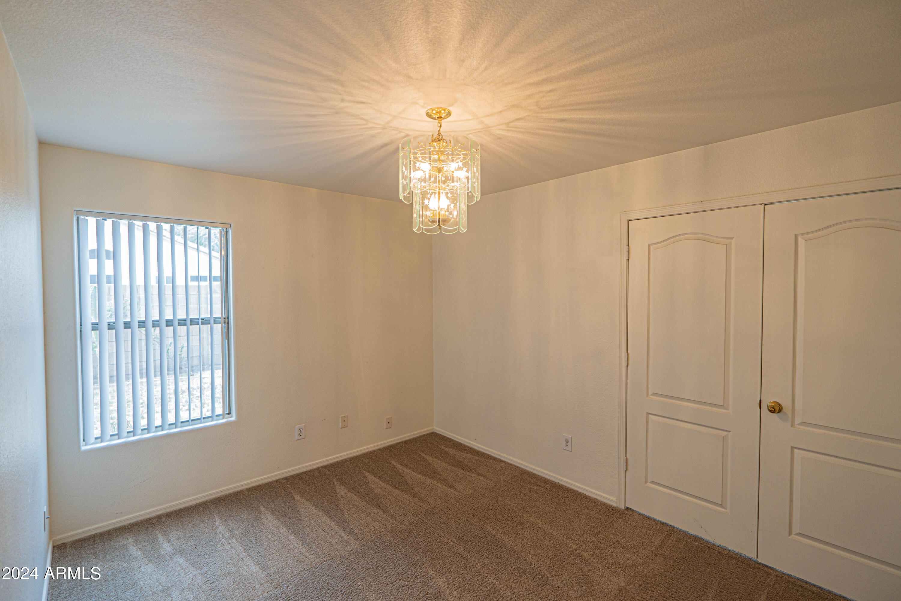 1729 East Del Rio Street Gilbert, AZ 85295 - Photo 16 of 19 an empty room with windows and entrance