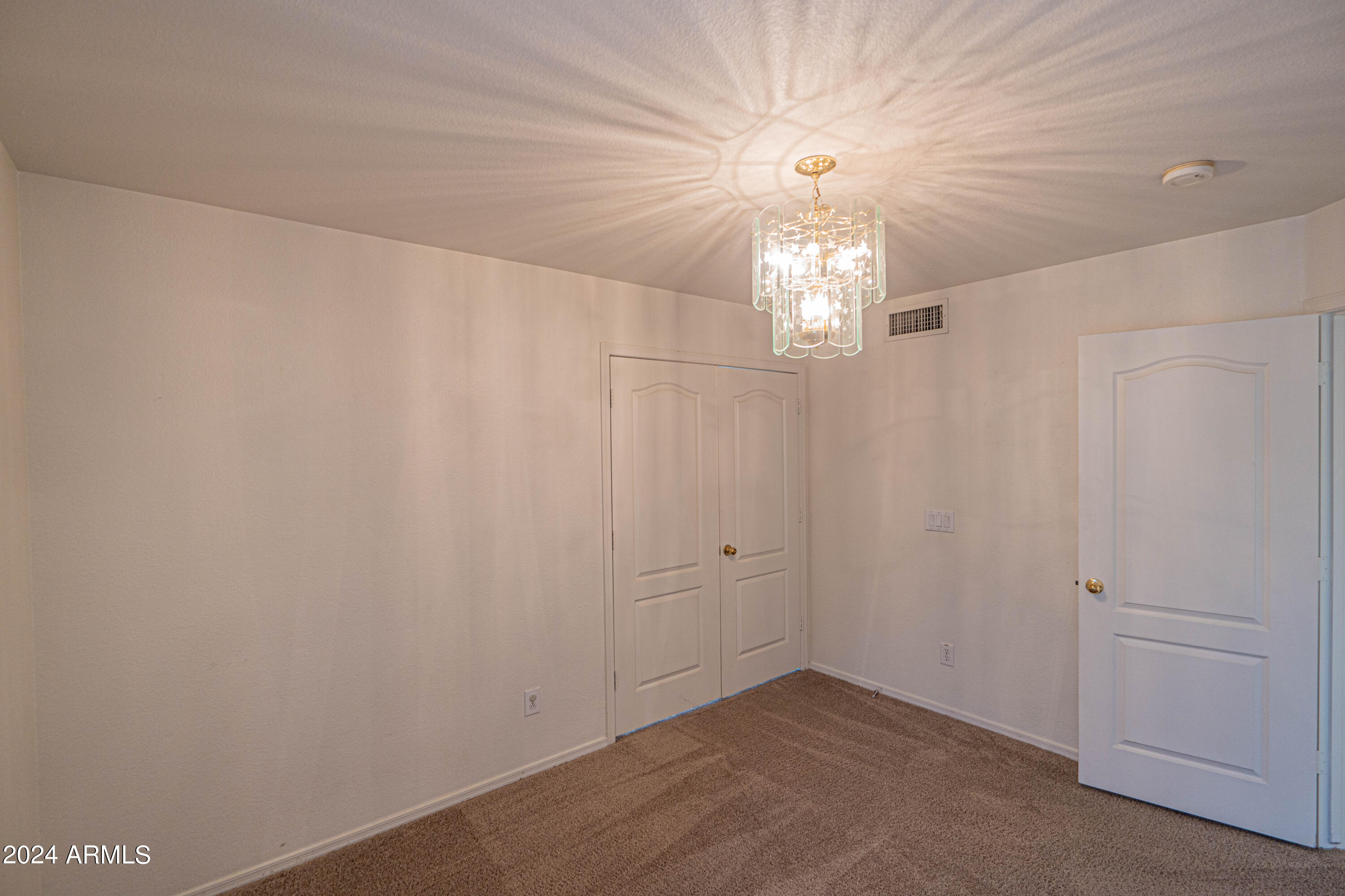 1729 East Del Rio Street Gilbert, AZ 85295 - Photo 19 of 19 wooden floor in a hall with an entryway