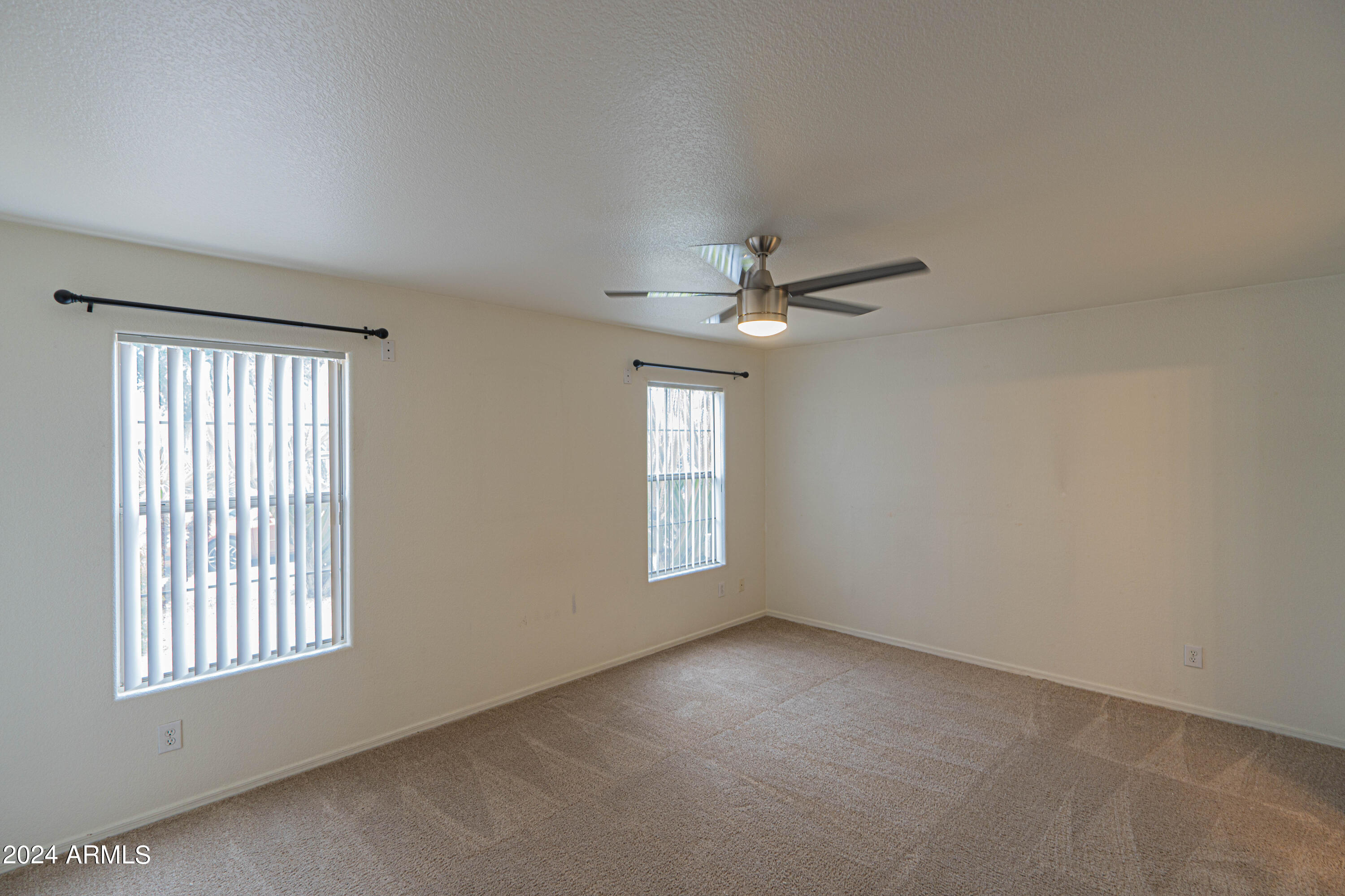 1729 East Del Rio Street Gilbert, AZ 85295 - Photo 4 of 19 a view of empty room with windows
