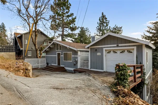 a front view of a house with a garage