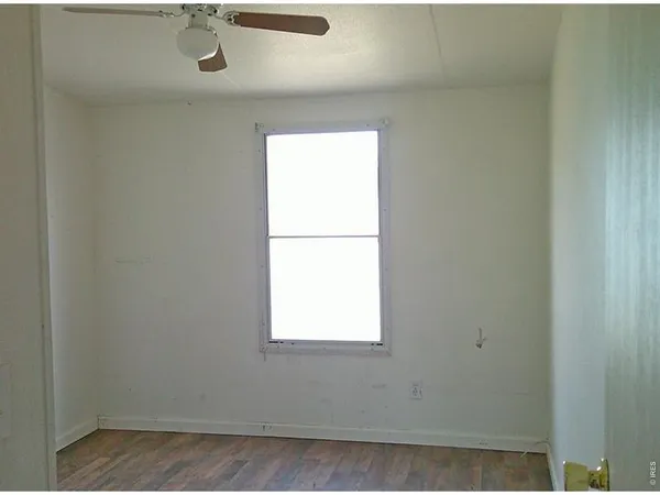 a view of a window in an empty room