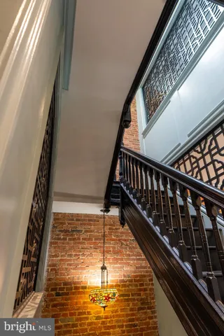 a view of swimming pool with wooden floor