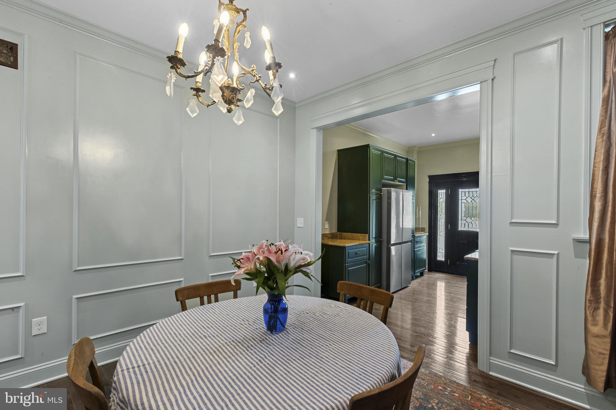 420 East Biddle Street Baltimore, MD 21202 - Photo 8 of 47 a dining room with furniture and chandelier