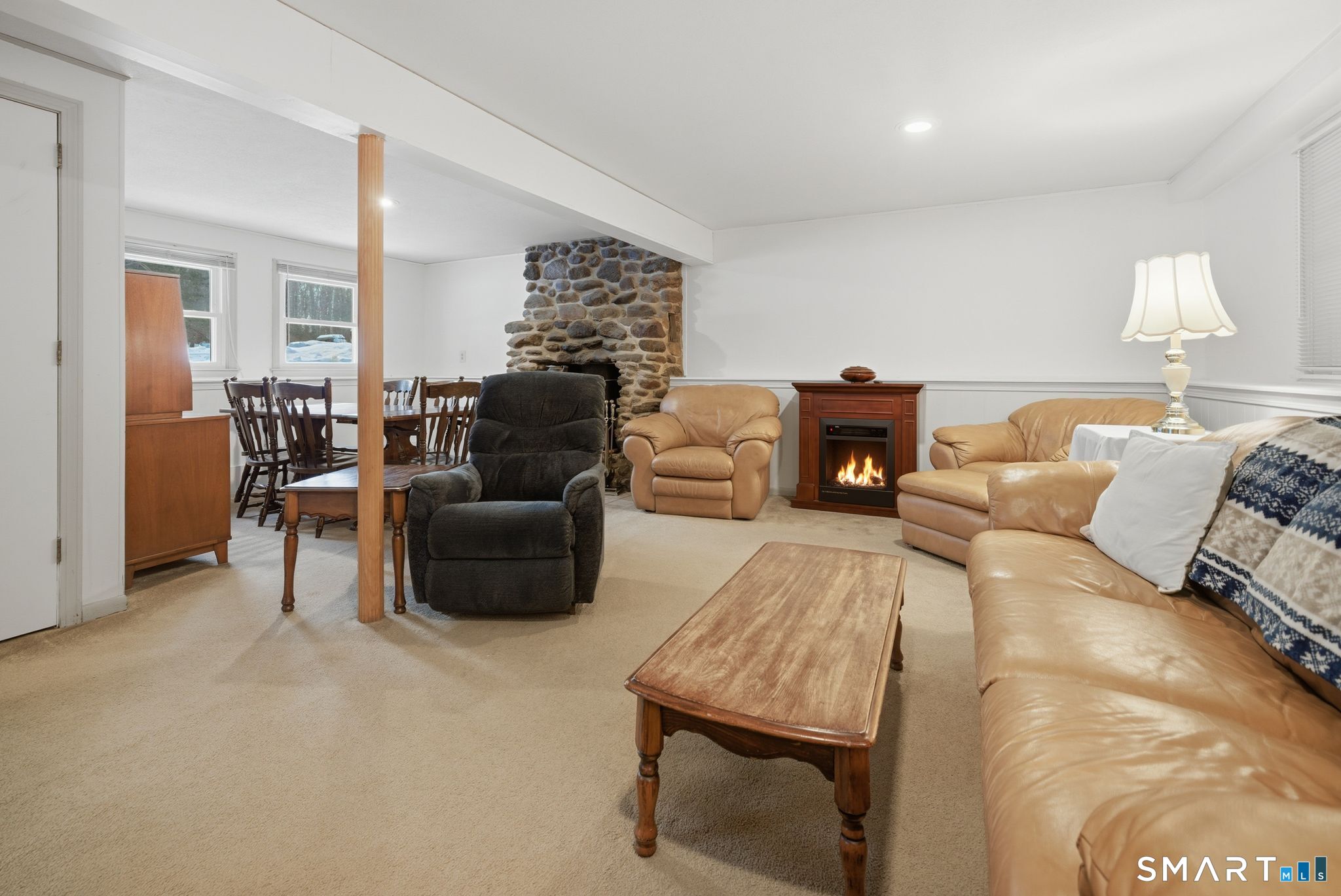 9 Wheelock Road Ellington, CT 06029 - Photo 22 of 31 With stone fireplace & woodstove