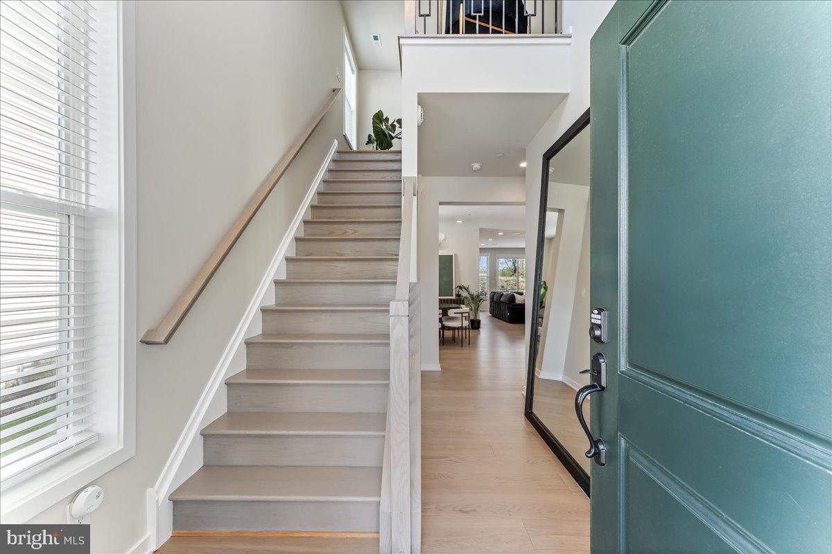 722 Switchman Road Media, PA 19063 - Photo 16 of 46 a view of entryway and hall with wooden floor